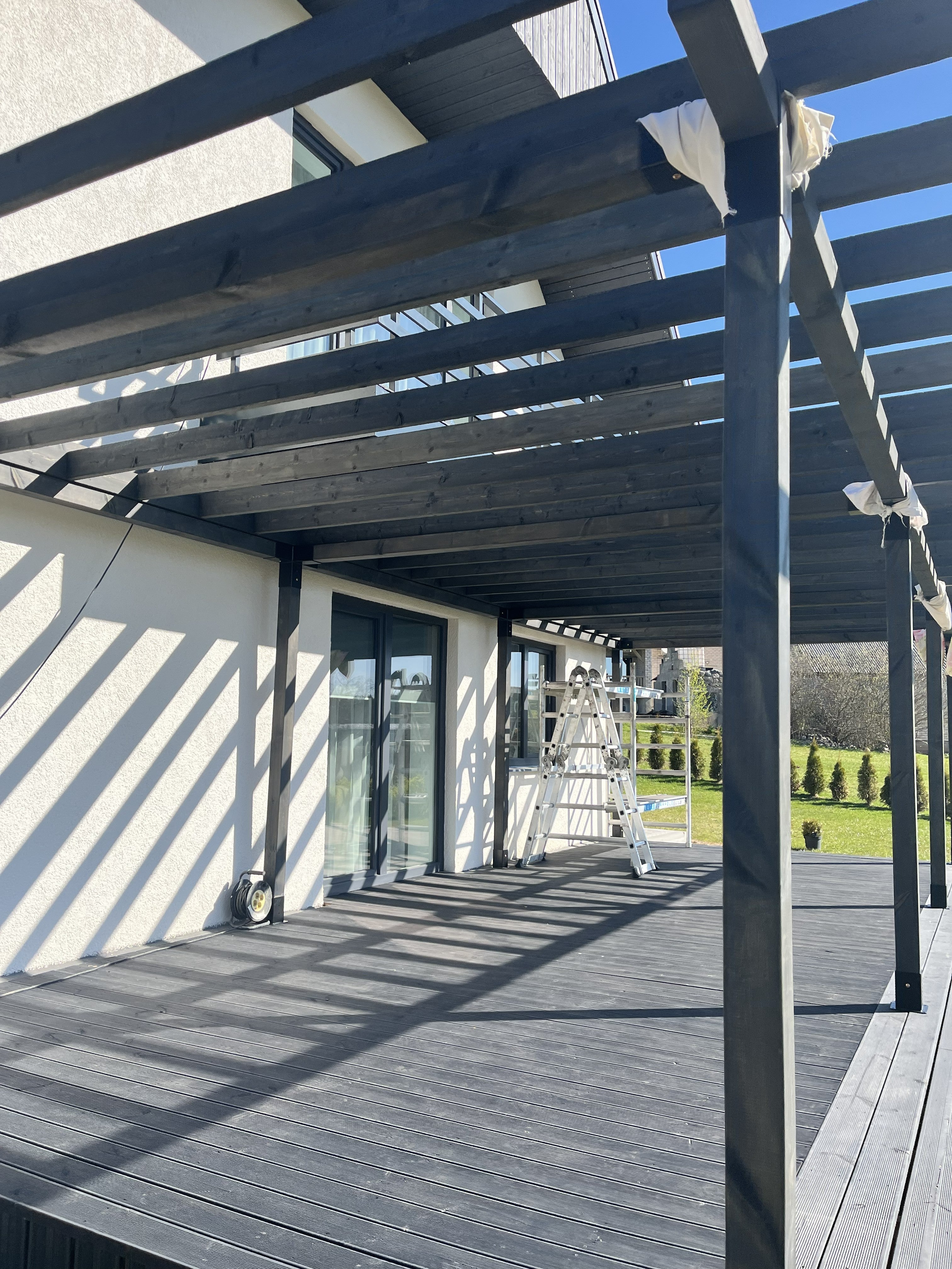 Modular DIY canopy by Terases, 10mx4.5m, showing assembled steel frame with fabric cover for outdoor shade and shelter.
