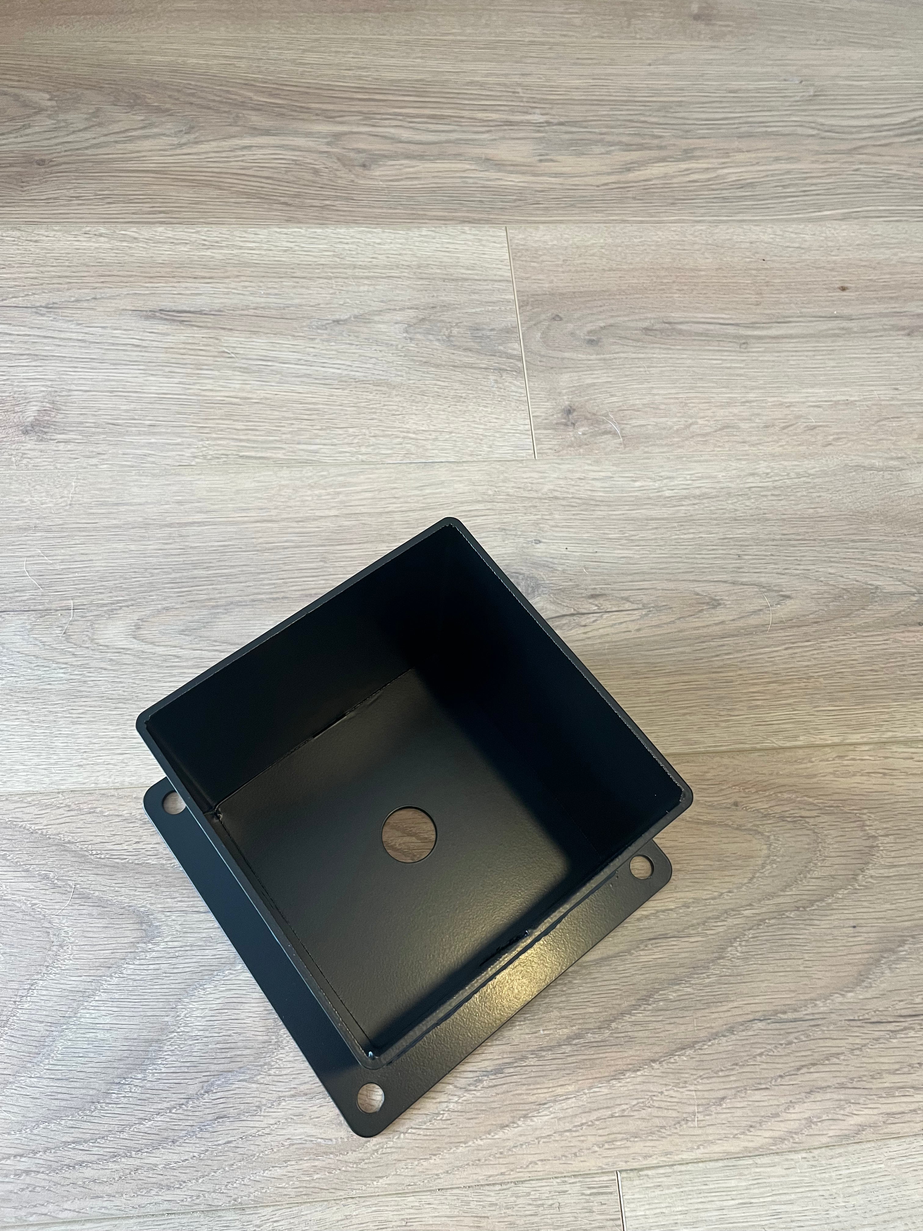 Terases Post Base Bracket for 145x145mm lumber, showing a sturdy metal support with bolts for outdoor post installation.