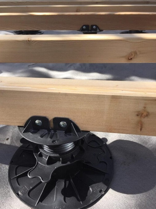 Adjustable patio support feet.