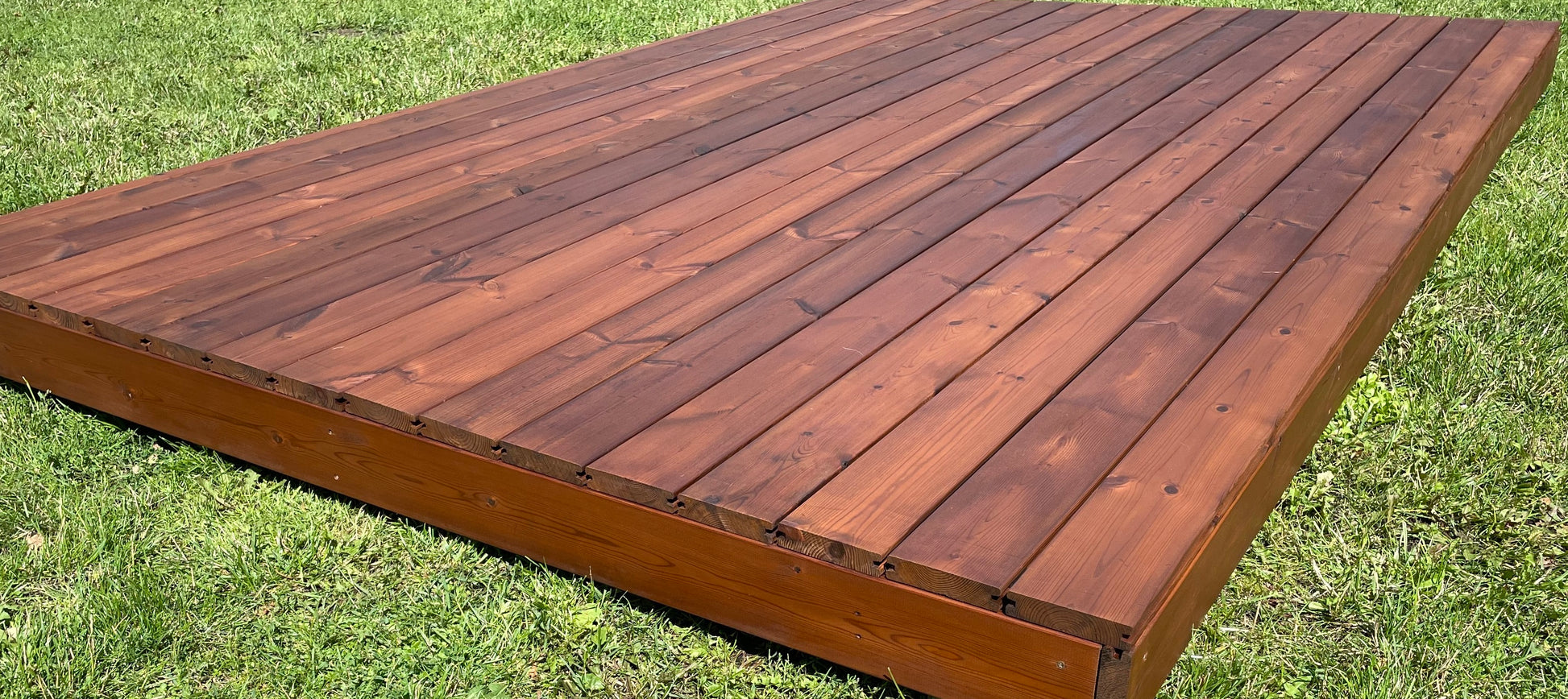 Wooden deck on grass
