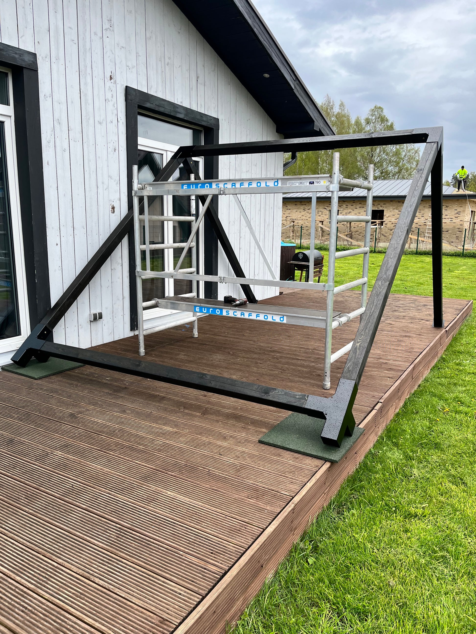 wooden deck to a grassy area