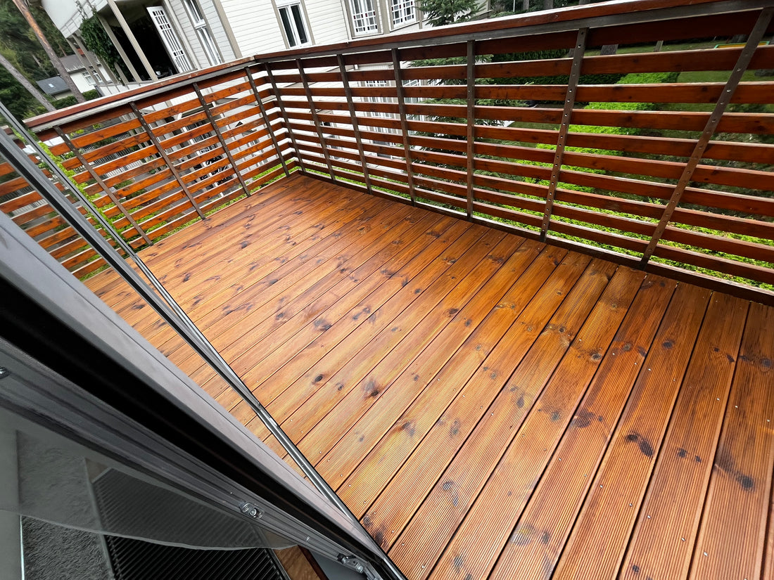 Wooden deck with railing on a balcony