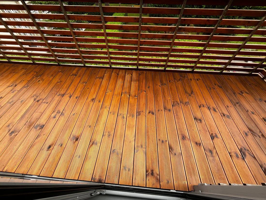 Wooden deck with railing on a balcony