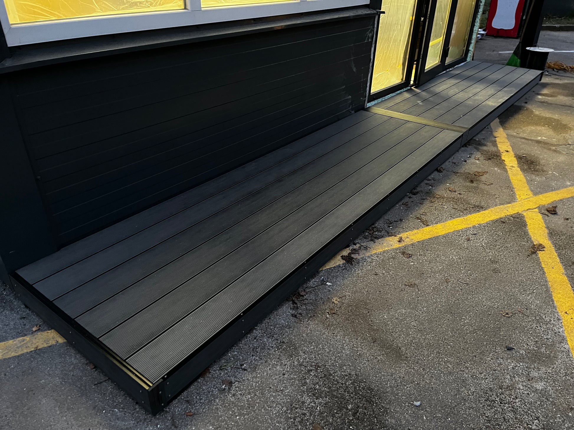 Longdeck on a concrete surface with yellow lines